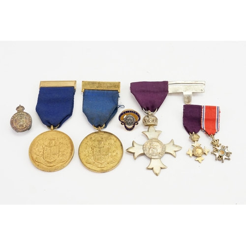 615 - A silver order of the British Empire medal, along with a miniature order of ST. OLAF Norway enamelle... 