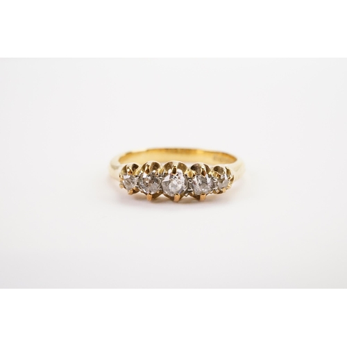 140 - A 22ct Gold Diamond set Ring set with five Diamonds, largest approximately 0.18ct. Size N. Weight 3.... 