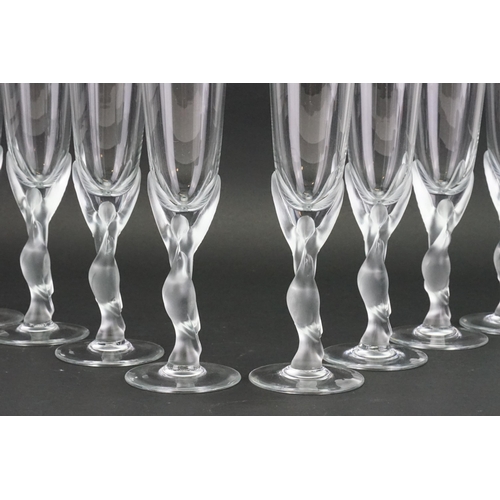 712 - A set of 12 crystal snow dove Faberge champagne flutes, marked on base. Unused condition in original... 