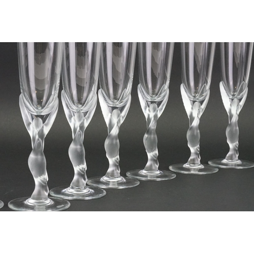 712 - A set of 12 crystal snow dove Faberge champagne flutes, marked on base. Unused condition in original... 