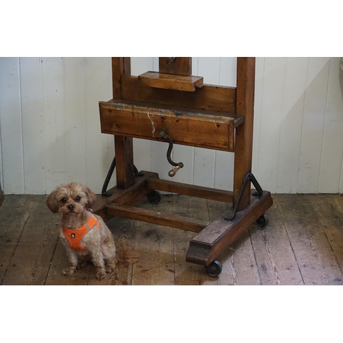 553 - A Large Late 19th Century Chestnut Easel with winding mechanism, Block rest & Thumb Piece. Measuring... 