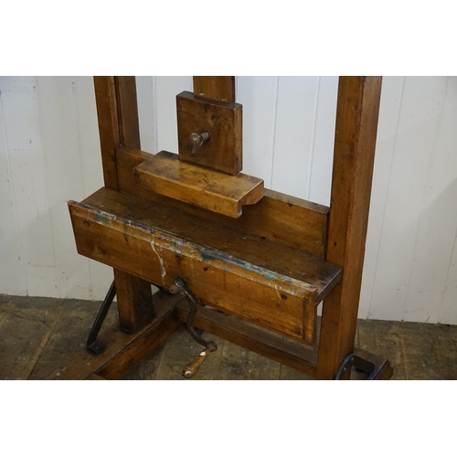 553 - A Large Late 19th Century Chestnut Easel with winding mechanism, Block rest & Thumb Piece. Measuring... 