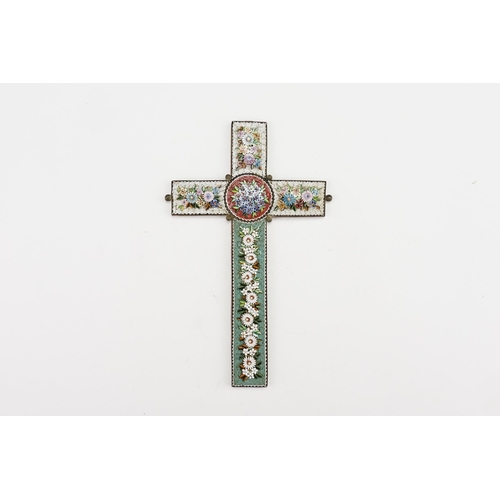 203 - A large Italian Iron mounted Cross in Micro Mosaic on a white & green background decorated with garl... 