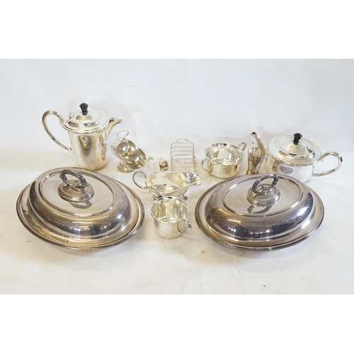 101 - Two Silver Plated Entre Dishes & Covers, a Four Piece Silver Plated Tea Set, a Silver Plated Sauce B... 