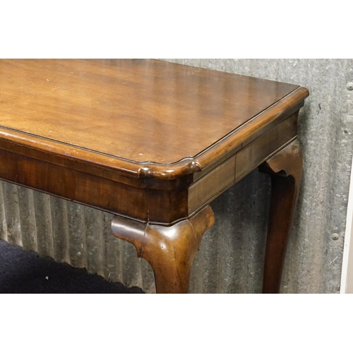 552 - A George II designed Mahogany Entrance Hall Side Table in the Irish Taste resting on Elongated Pad F... 