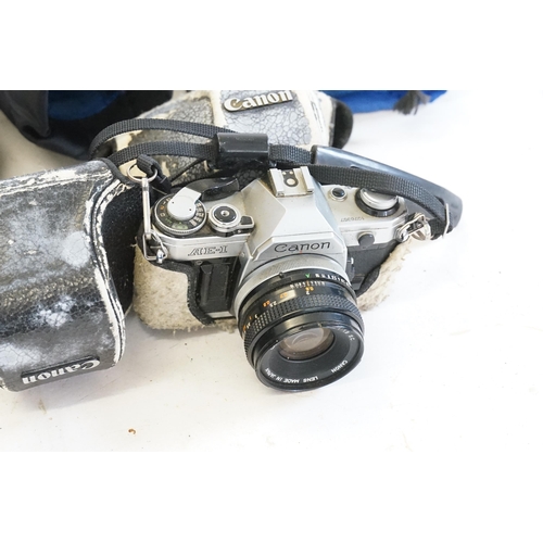 751 - Two Canon Cameras in Original Cases to include 2 x AE1 FD50mm 1.18SC, a Panasonic Mega D1S DMC FZ250... 