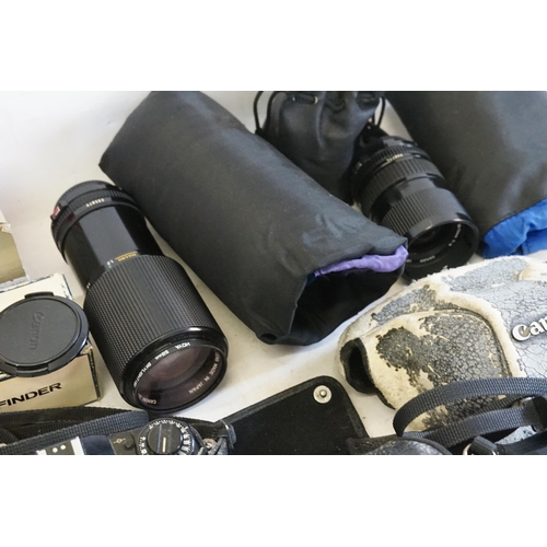 751 - Two Canon Cameras in Original Cases to include 2 x AE1 FD50mm 1.18SC, a Panasonic Mega D1S DMC FZ250... 