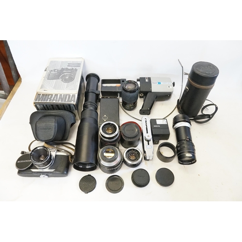 753 - A Miranda Sensomat 504 389 1.2.8 RS Camera, a Solgar Lens, one other Lens, Paragon 64473 attachment ... 