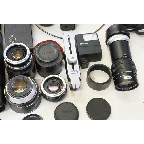 753 - A Miranda Sensomat 504 389 1.2.8 RS Camera, a Solgar Lens, one other Lens, Paragon 64473 attachment ... 