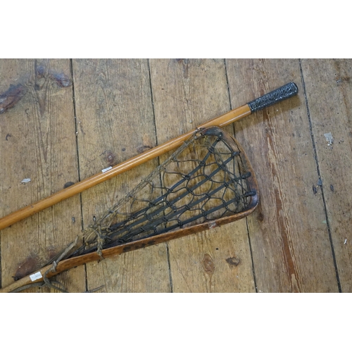 641 - An Antique Elm & Catgut Lacrosse Stick (AF) & a Chinese Silver Coloured White Metal Walking Stick.