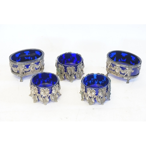 106 - A Pair of French Directoire Salt Cellars decorated with Cupids & Festoone's with Blue Glass Liners a... 