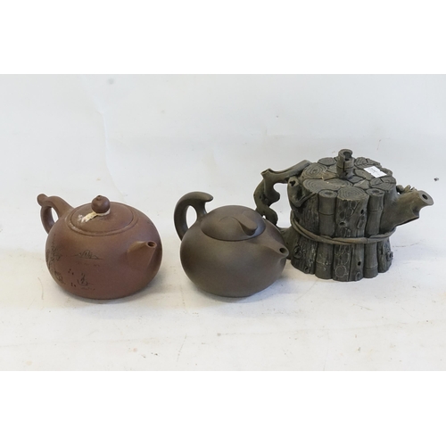 285 - A Chinese Yixing Tea Pot decorated with Calligraphy & Stamp, one other stylised Tea Pot & Clumpy Pot... 