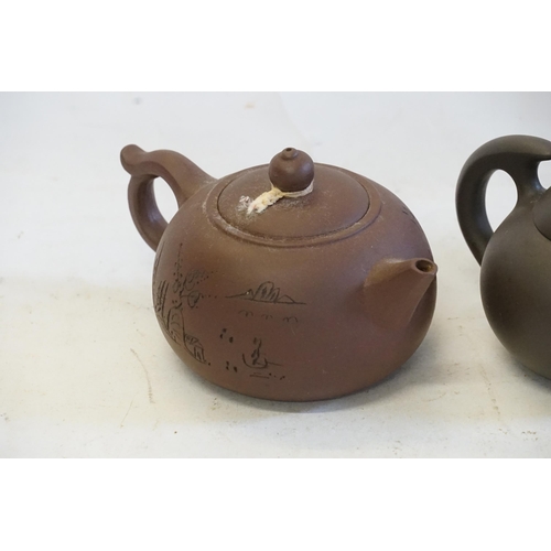 285 - A Chinese Yixing Tea Pot decorated with Calligraphy & Stamp, one other stylised Tea Pot & Clumpy Pot... 