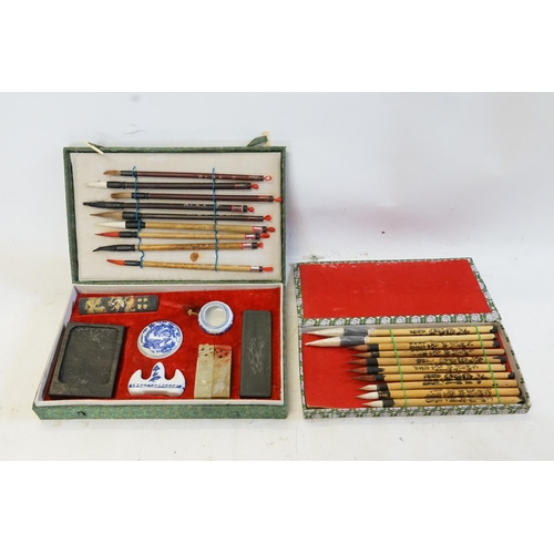 286 - A Chinese Cased Calligraphy Set with Paste Pot, Ink Stone, Washer, Two Seals & Brushes along with Se... 