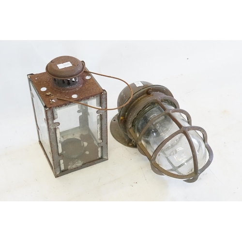 610 - A Copper Bulk Head Light Fitting & a Tin Lantern.