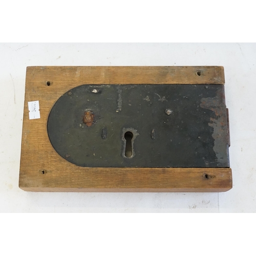 611 - An Large Antique Lock contained in an Oak Case.