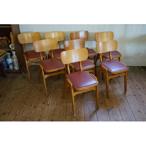 538 - A Set of 8 Plywood & Jointed Kitchen Chairs in the 1950s style with Rexine Seats & Metal Studs.