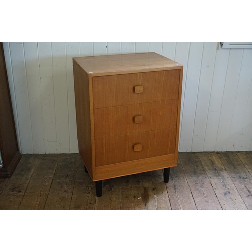 539 - A 1950s design Chest of Three Graduated Drawers. Measuring: 61cms across x 45cms deep x 87cms high.