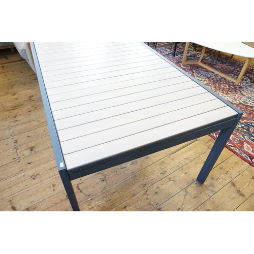 574 - An Extending Grey & Wood Effect Garden Table. Measuring: 268cms Long x 101cms across. (Total Extende... 