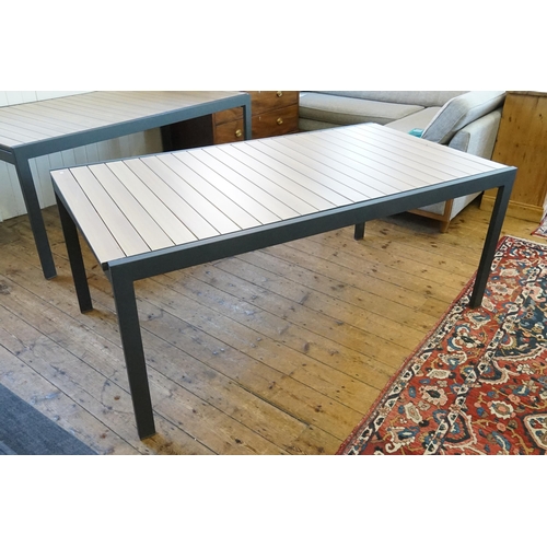 575 - An Extending Grey & Wood Effect Garden Table. Measuring: 268cms Long x 101cms across. (Total Extende... 