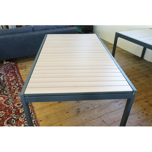 575 - An Extending Grey & Wood Effect Garden Table. Measuring: 268cms Long x 101cms across. (Total Extende... 