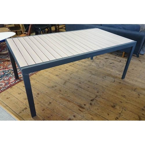 575 - An Extending Grey & Wood Effect Garden Table. Measuring: 268cms Long x 101cms across. (Total Extende... 