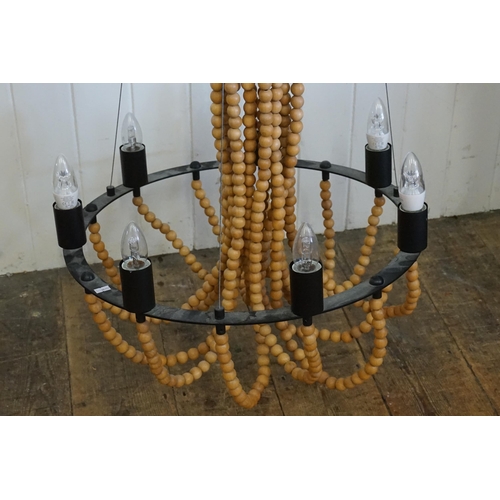 750 - A Large 1960s design Ceiling Light hung with Wooden Beads.