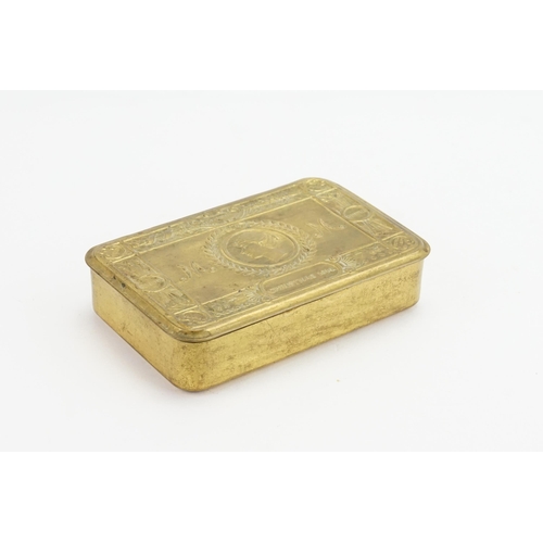 617 - A 1914 Princess Mary's Christmas Fund Brass Cigarette Box containing Cigarettes with envelope.