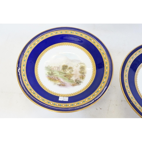 768 - A Pair of Minton design Blue ground Gilt & bordered Jewel decorated Tazza's, hand painted with 19th ... 