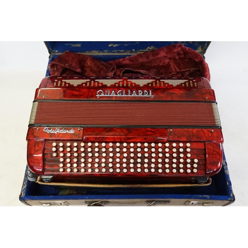 460 - A 1950s Accordion in Red Bakelite Case with Chrome fittings & Pearl Notes by 