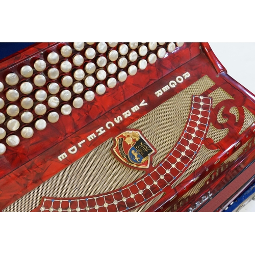 460 - A 1950s Accordion in Red Bakelite Case with Chrome fittings & Pearl Notes by 