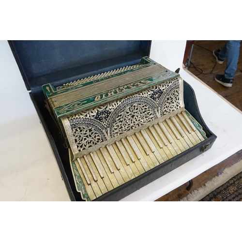 405 - A 1920s/1930s Green Bakelite & Silver Glittered Accordion with metal mounts & note made by 