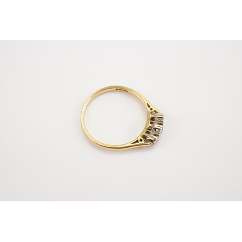 170 - A Three stone old mine Cut Diamond Ring with 18ct Gold setting. Size P. Weight 2.8g.