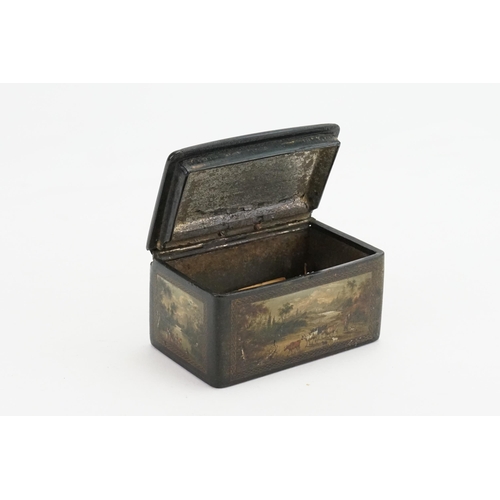 419 - An Antique 19th Century Paper Mache Snuff box, depicting various painted scenes. Size 8.7cms x 5.6cm... 