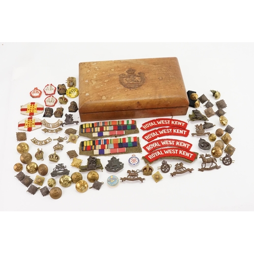 620 - A large collection of military memorabilia to include buttons, badges, ribbons awarded to R.Butler M... 