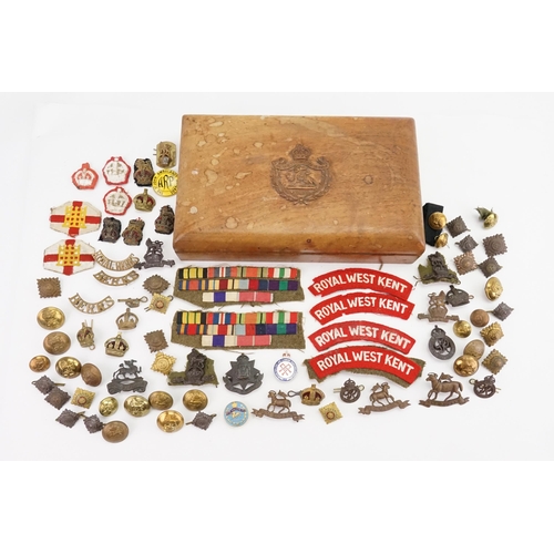 620 - A large collection of military memorabilia to include buttons, badges, ribbons awarded to R.Butler M... 