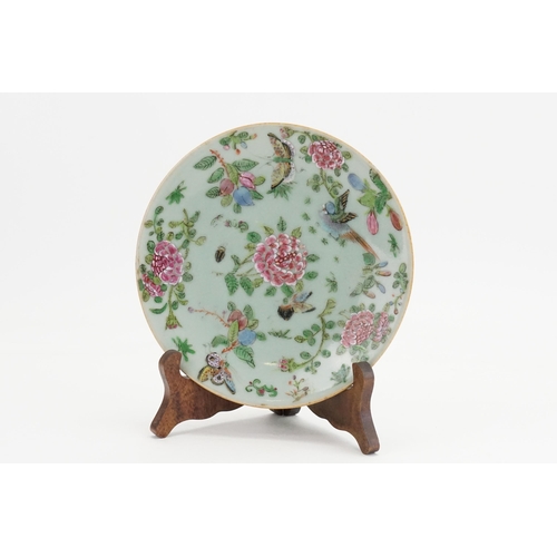 294 - A Chinese Glazed Famille rose decorated plate with a seal mark to base. Measuring: 18cms.