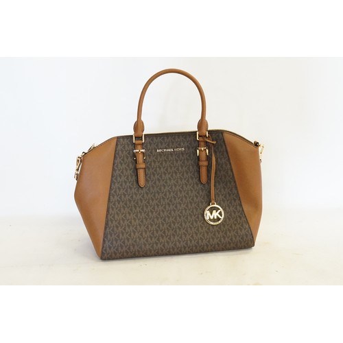 654 - A Michael Kors brown leather handbag, with the MK monogram.