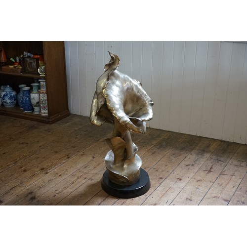 443 - A Very Large Cast Bronzed Arum Lily resting on a black marble base with protruding fronds, signed 