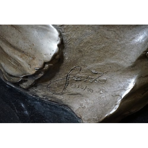 443 - A Very Large Cast Bronzed Arum Lily resting on a black marble base with protruding fronds, signed 