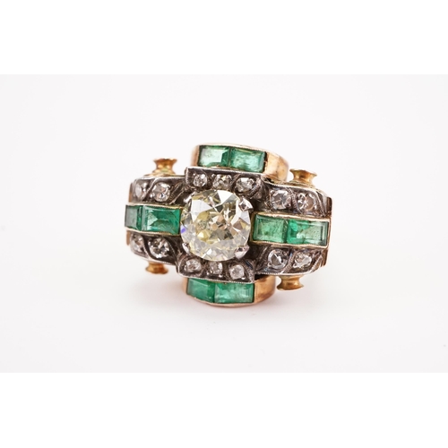 175D - A antique art deco diamond and emerald set ring, set with a approx 2ct round cut possible fancy yell... 