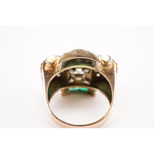 175D - A antique art deco diamond and emerald set ring, set with a approx 2ct round cut possible fancy yell... 