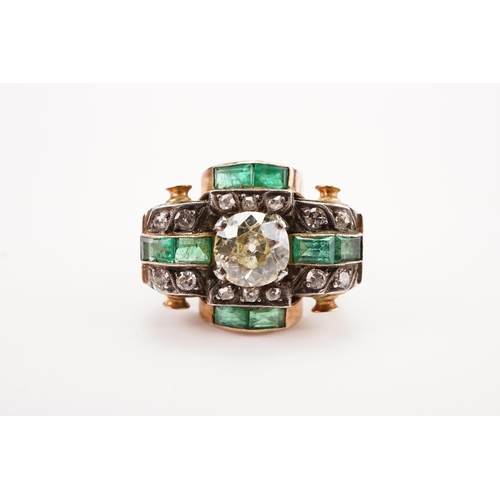 175D - A antique art deco diamond and emerald set ring, set with a approx 2ct round cut possible fancy yell... 