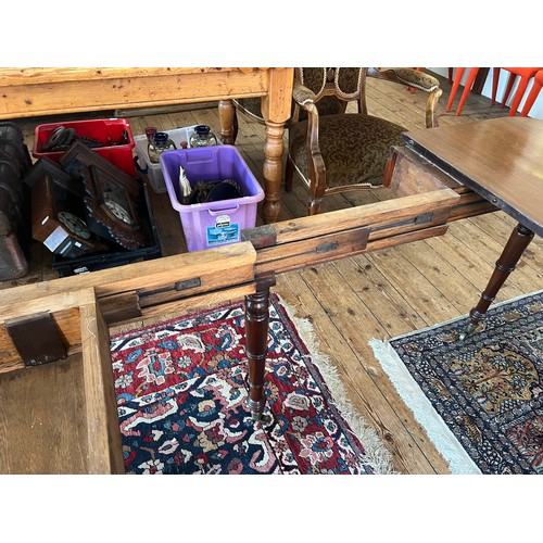 491 - A Regency Mahogany Pull Out Extending Campaign Table after a design to John McLean (?) fitted with t... 