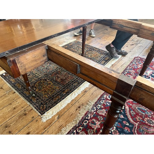 491 - A Regency Mahogany Pull Out Extending Campaign Table after a design to John McLean (?) fitted with t... 