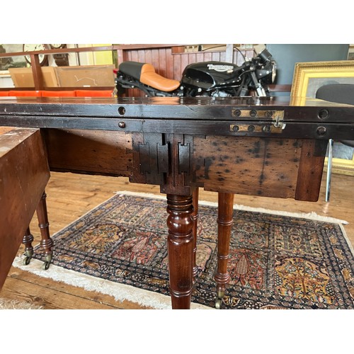 491 - A Regency Mahogany Pull Out Extending Campaign Table after a design to John McLean (?) fitted with t... 