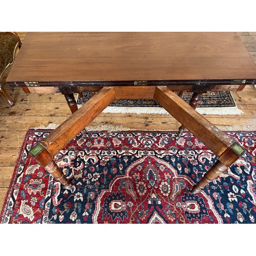 491 - A Regency Mahogany Pull Out Extending Campaign Table after a design to John McLean (?) fitted with t... 