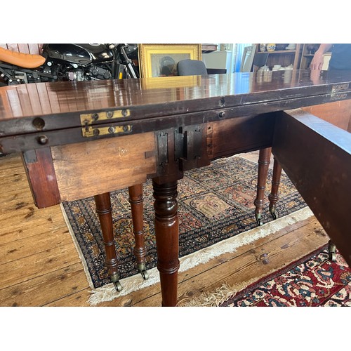 491 - A Regency Mahogany Pull Out Extending Campaign Table after a design to John McLean (?) fitted with t... 