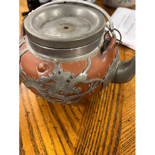 319 - A Five Piece Early 20th Century Chinese Hor Chung Pewter Mounted Yixing Clay Tea Set. The teas set i... 