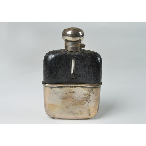 19 - A Silver Hip Flask in a Glass & Leather mounted case with a Bayonet fitting.